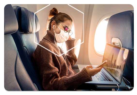 Woman wearing mask on plane